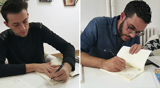 Escritor e Ilustrador firmando dedicando los libros a sus mecenas